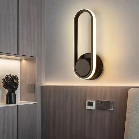 APLIQUE DE MURO INTERIOR OVALADO LED TRES TONOS DE LUZ ANTON